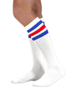 Load image into Gallery viewer, Unisex adult size white knee high tube sock with three royal blue and red stripes
