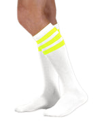 Load image into Gallery viewer, Unisex adult size white knee high tube sock with three fluorescent neon yellow stripes
